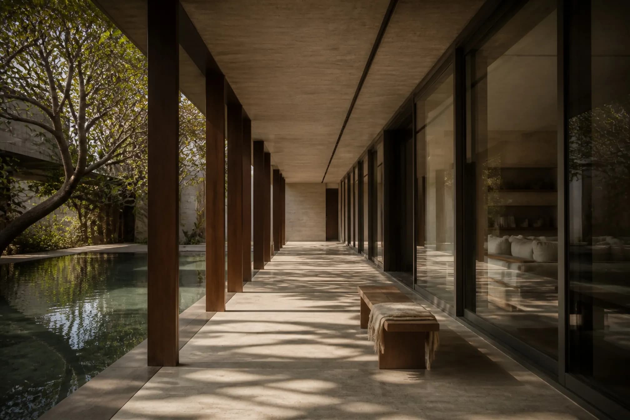 Deep shaded verandah in honed Kota limestone running between the courtyard and the living room